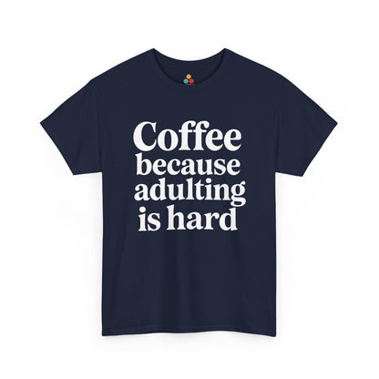 “Teezoca Coffee Because Adulting Is Hard shirt, white text coffee quote, navy blue tee, flat front display.”