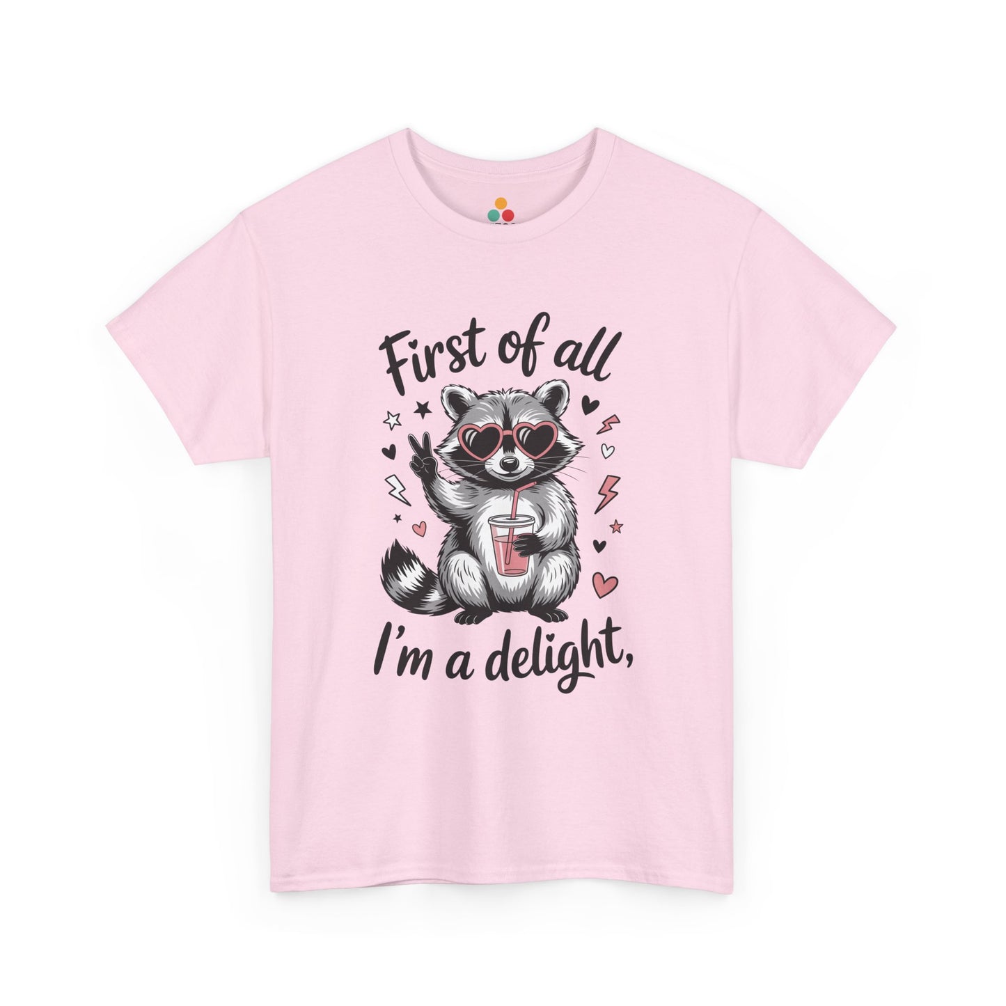 TEEZOCA pink “First of all I’m a delight” adorable raccoon graphic tee shown flat.