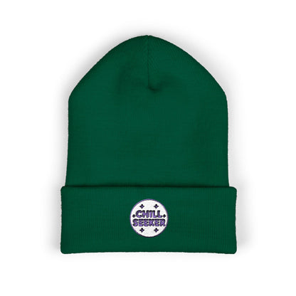 Green beanie with 'Chill Seeker' patch on a white background