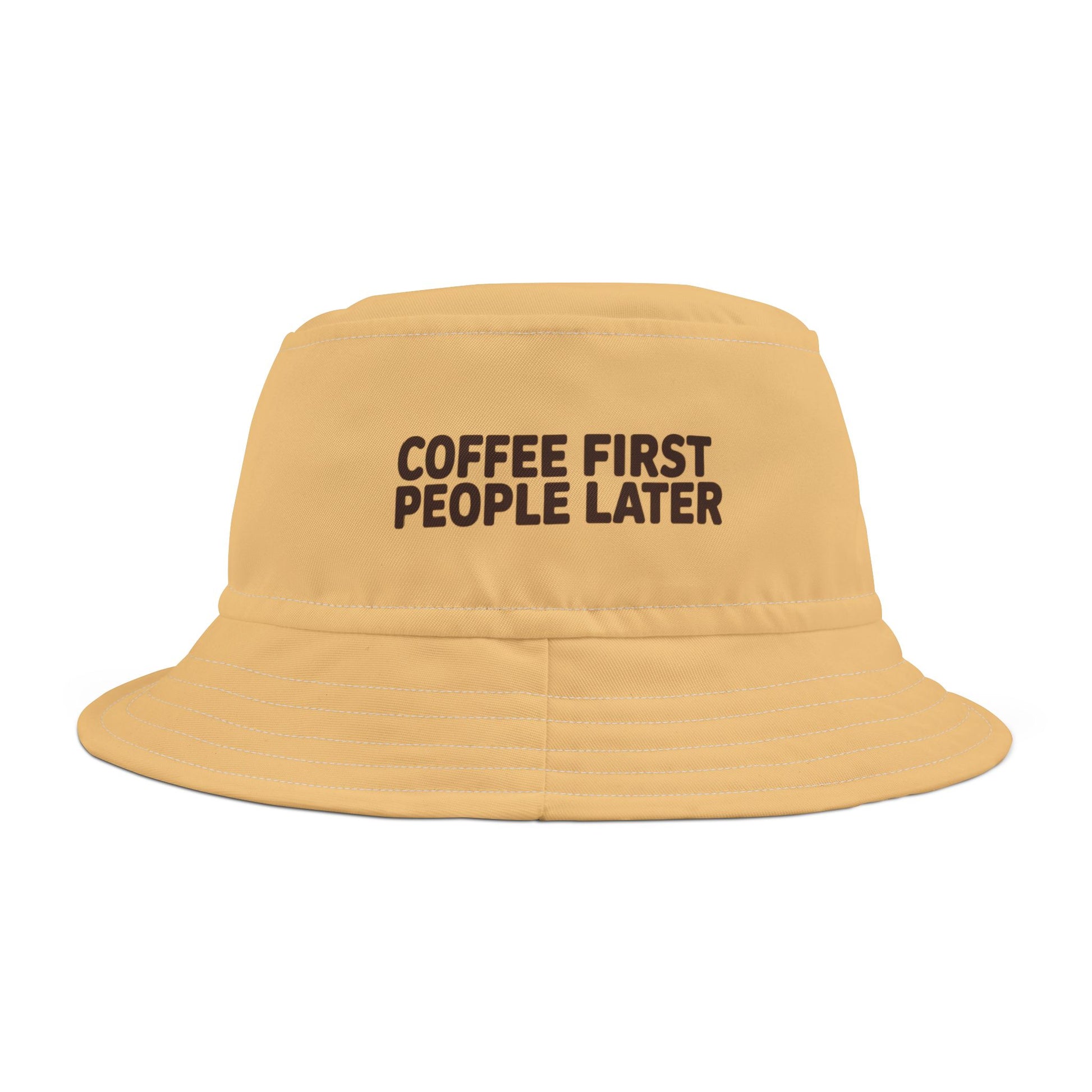 Funny yellow bucket hat with 'Coffee First, People Later' text on a white background. TEECOZA