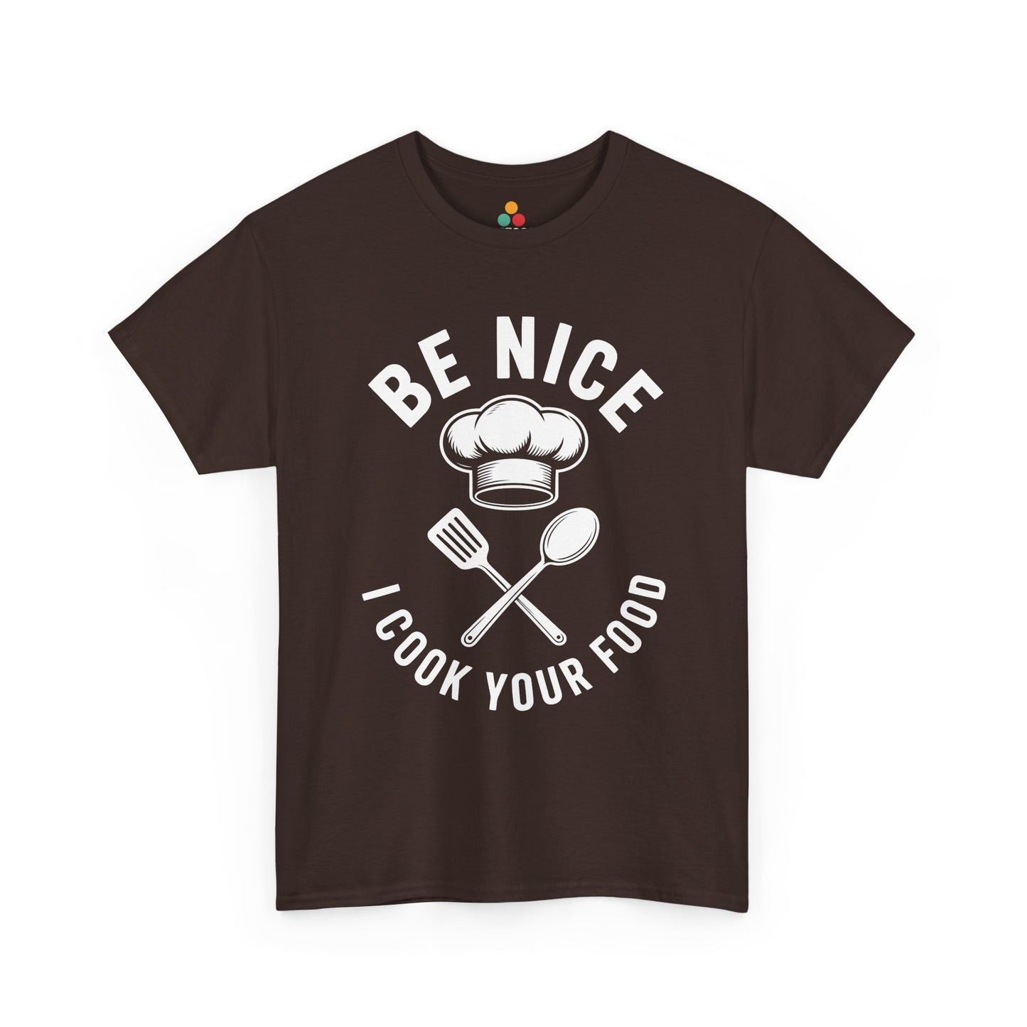 “Teezoca Be Nice I Cook Your Food t-shirt, bold kitchen quote and chef graphic, dark brown tee, front view.”

