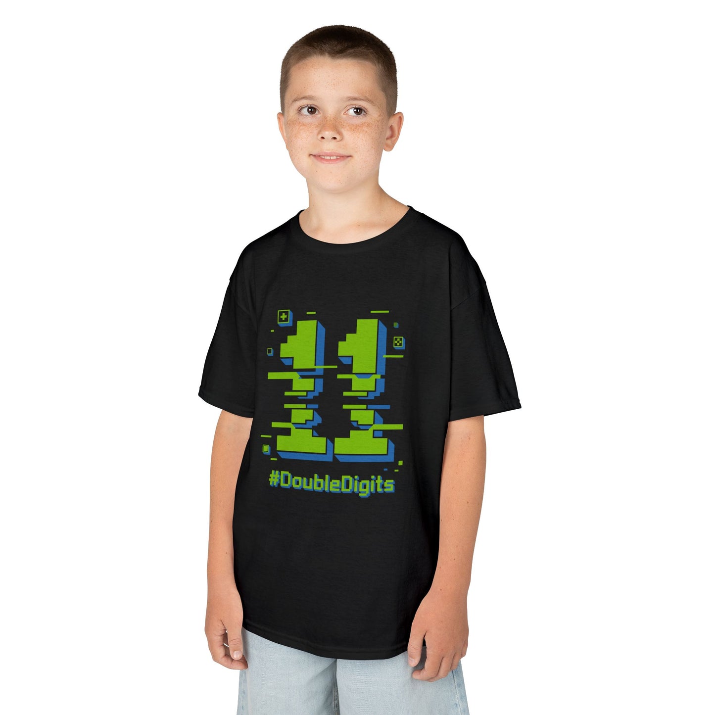 child wearing Black kids’ t‑shirt with neon green and blue pixel number 11 and “#DoubleDigits” gamer text, flat front view.