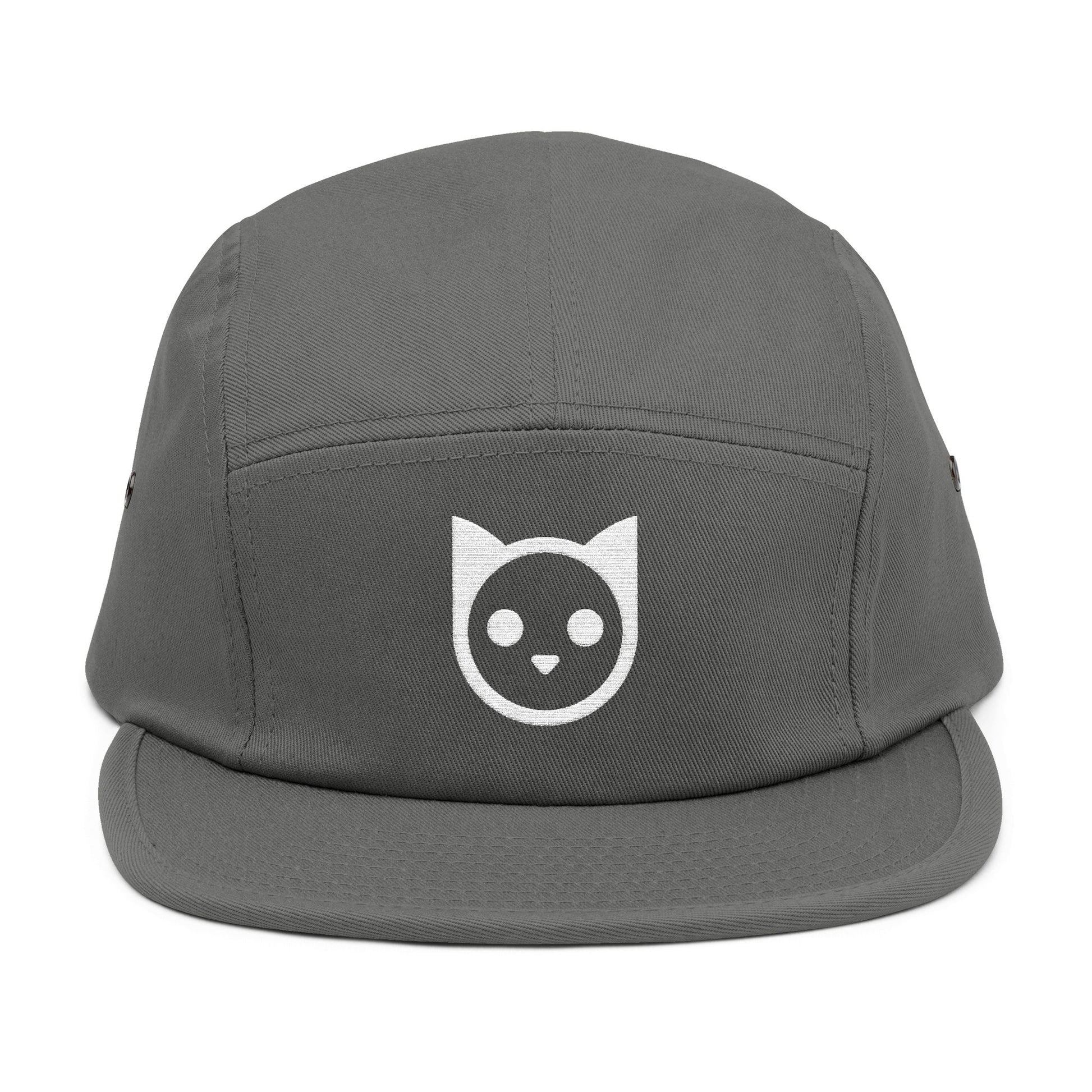 Gray cap with a white cat face logo on a white background. Minimal embroidered cat icon design on 5-panel cap. TEEZOCA
