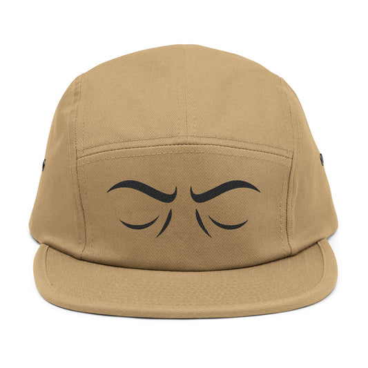 Tan cap with black eye design on a white background. Minimal unimpressed eyes embroidery line art design. TEEZOCA