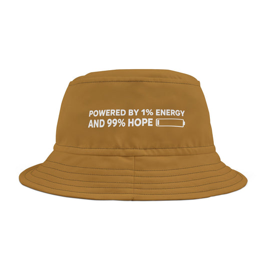 Brown bucket hat with funny motivational text 'Powered By 1% Energy And 99% Hope' on a white background. TEEZOCA