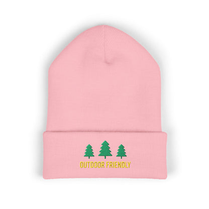 Pink beanie with green trees and 'Outdoor Friendly' text on a white background
