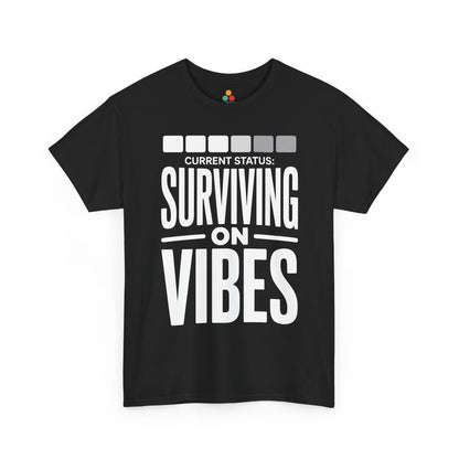 Black t-shirt with white text 'CURRENT STATUS: Surviving on VIBES' on a white background | TEEZOCA