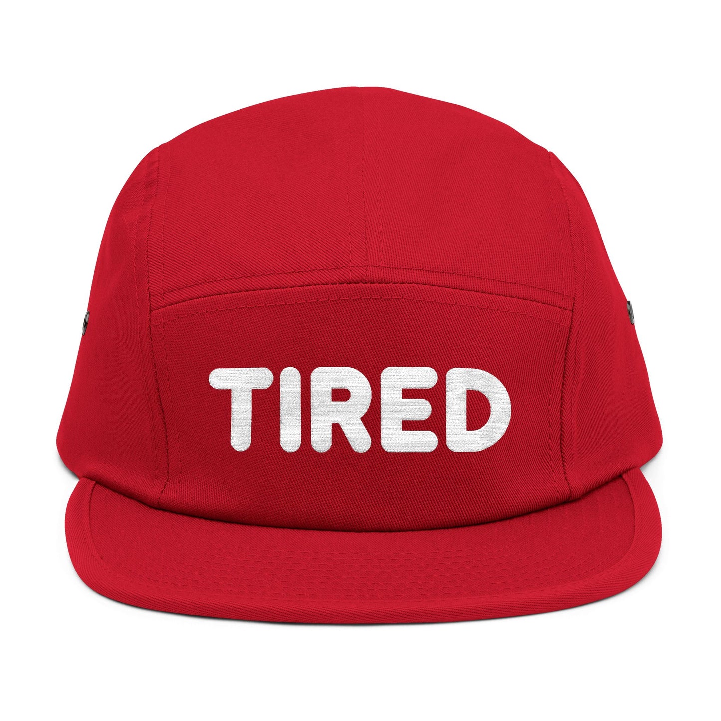Red cap with 'TIRED' text on a white background. TIRED minimalist text embroidered on 5-panel cap by TEEZOCA