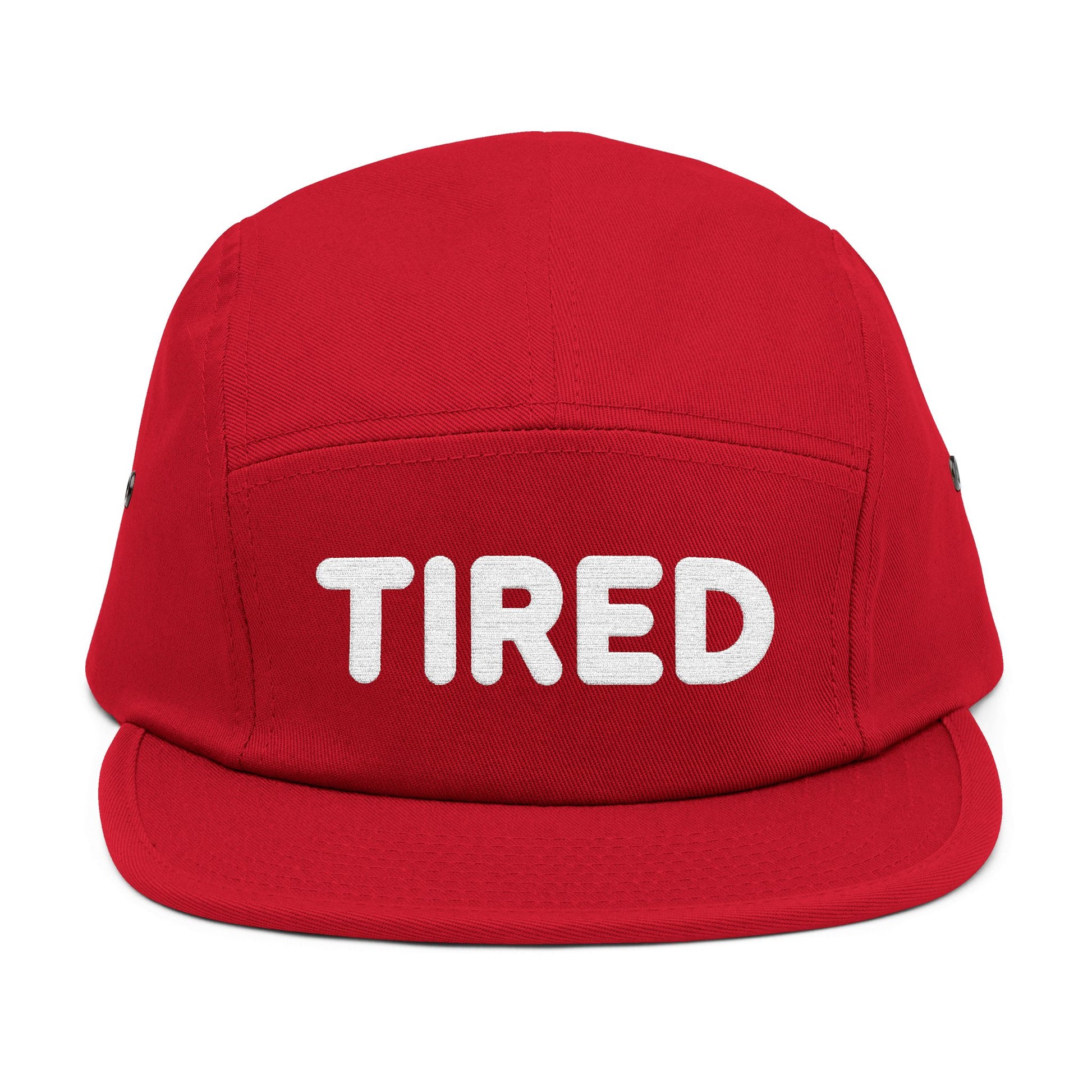 Red cap with 'TIRED' text on a white background. TIRED minimalist text embroidered on 5-panel cap by TEEZOCA