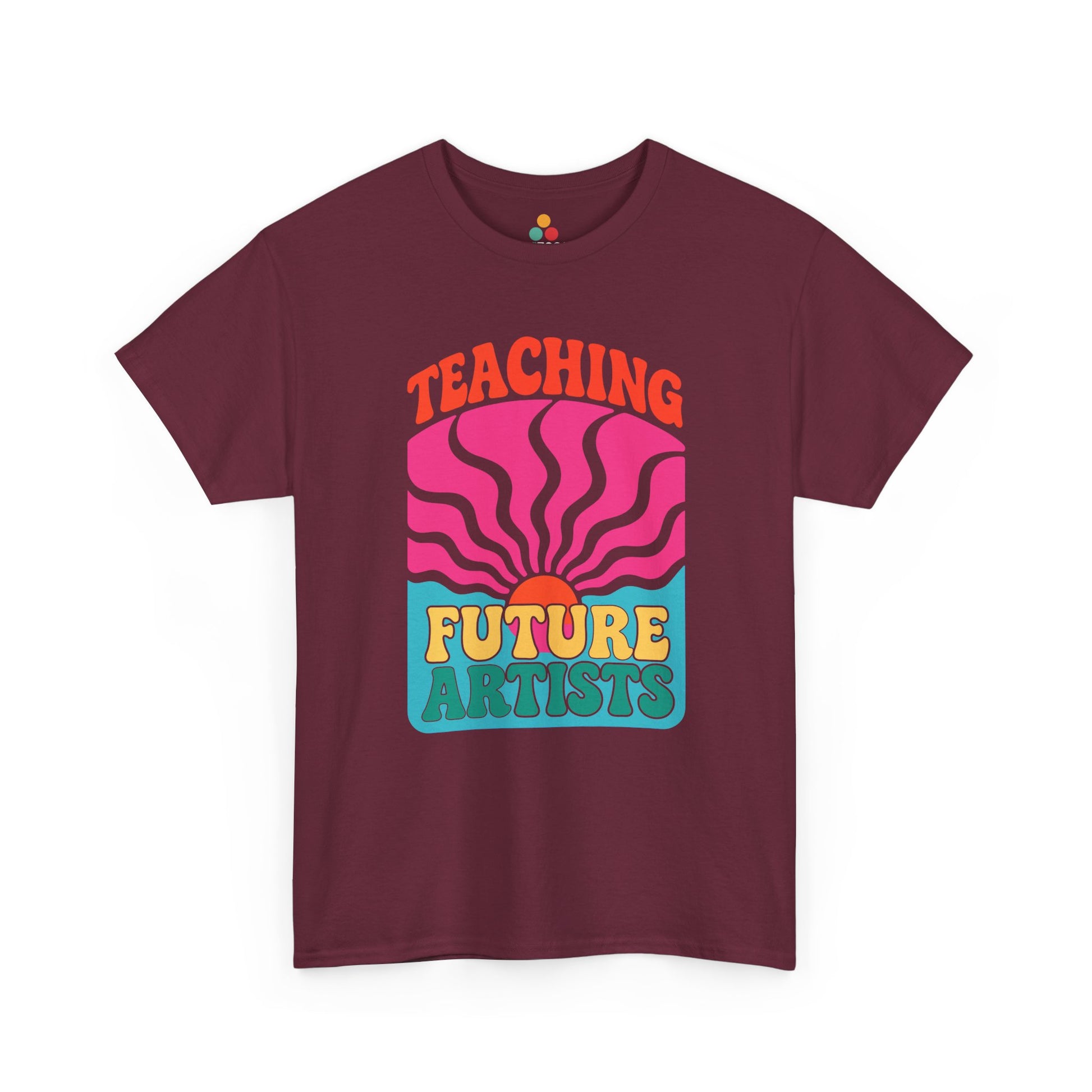 "maroon 'Teaching Future Artists' shirts with colorful paint palette artwork, flat front view."

