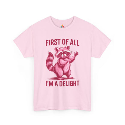 TEEZOCA pink “First Of All I’m A Delight” adorable raccoon graphic tee shown flat.