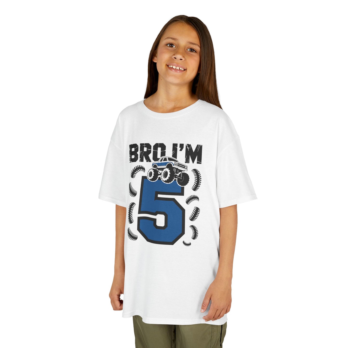 Child wearing a white t-shirt with 'Bro I'm 5' graphic design on a  White kids' t‑shirt with "Bro I'm 5" dirt bike motorcycle graphic in blue and black, flat front viewbackground