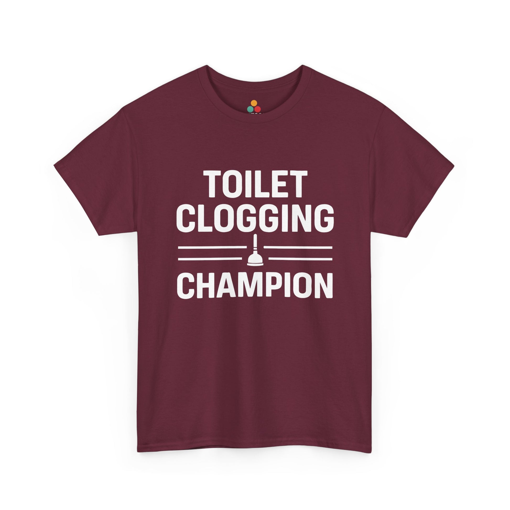 Maroon unisex t‑shirt with bold white “Toilet Clogging Champion” slogan and plunger icon, flat front view.
