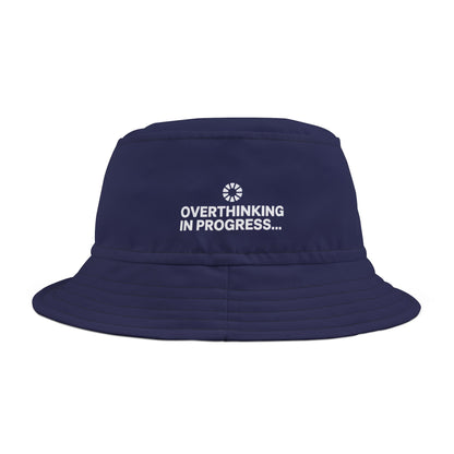 Funny navy bucket hat with 'Overthinking in Progress...' text on a white background. TEEZOCA
