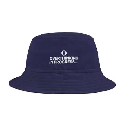 Funny navy bucket hat with 'Overthinking in Progress...' text on a white background. TEEZOCA