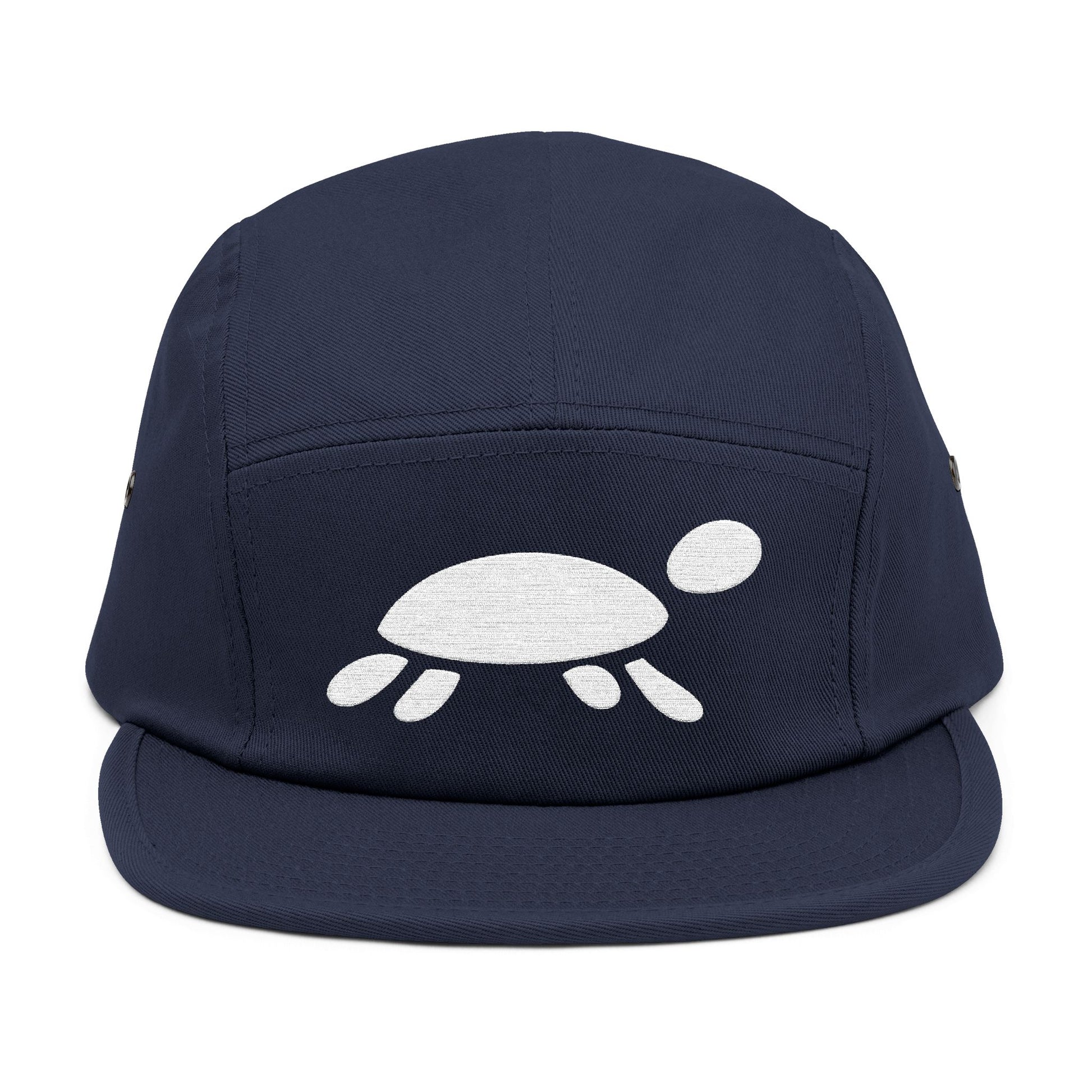 Navy blue cap with a white turtle design on a white background. Minimalist turtle outline embroidery design for 5-panel caps by TEEZOCA