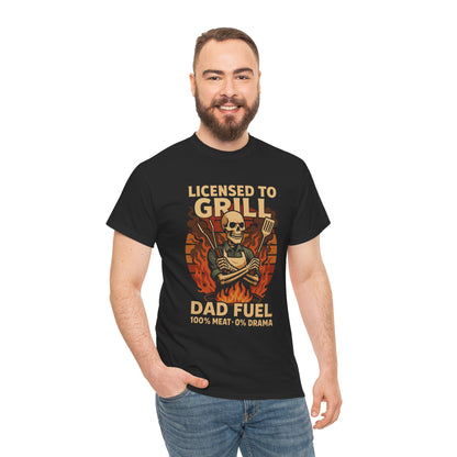 "Man wearing black 'Licensed to Grill – Dad Fuel' skeleton BBQ t‑shirt, front view."

