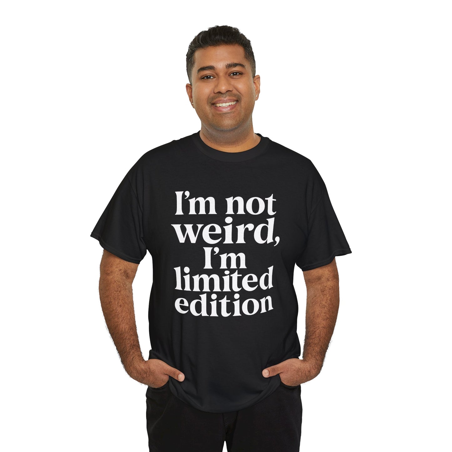 “Male model in Teezoca I’m Not Weird I’m Limited Edition shirt, white typography graphic, black tee, casual pose.”


