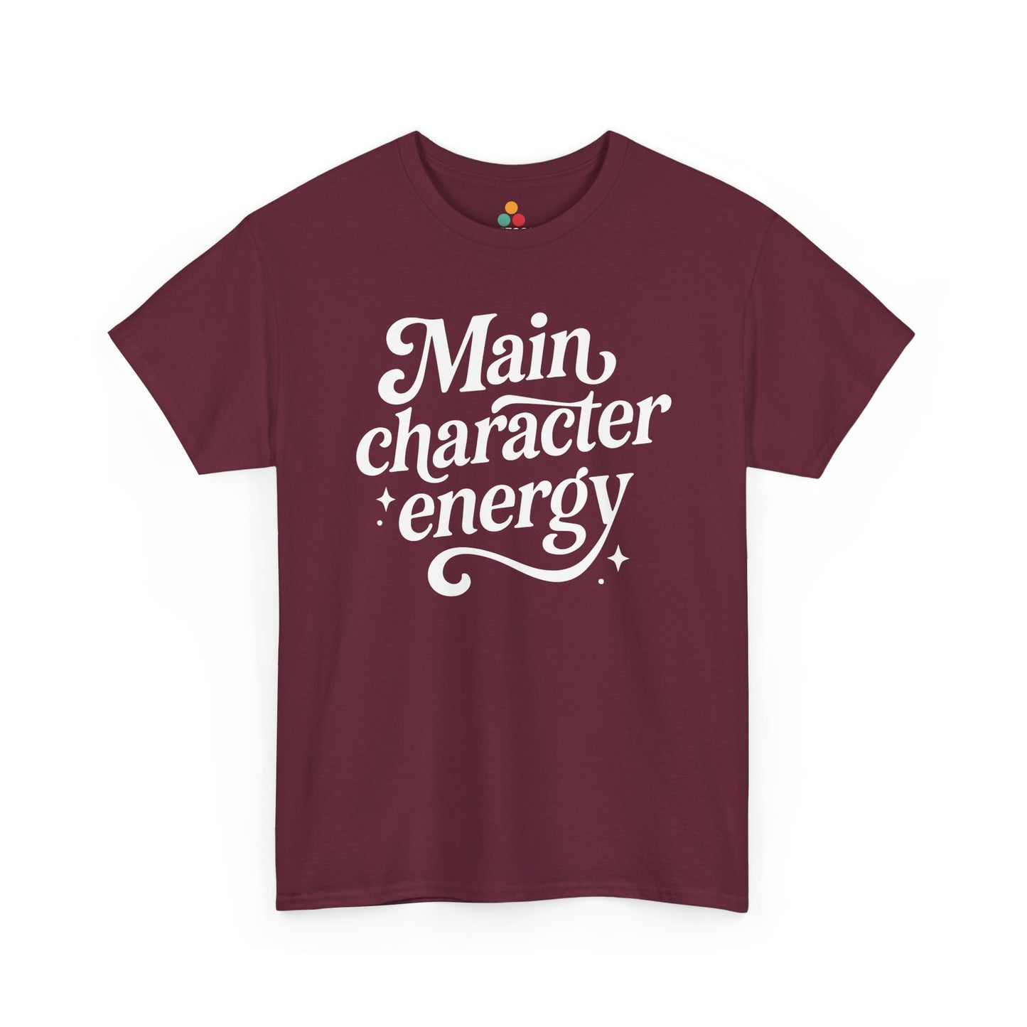 “Teezoca Main Character Energy shirt, white script and sparkles design, maroon tee, flat front display.”

