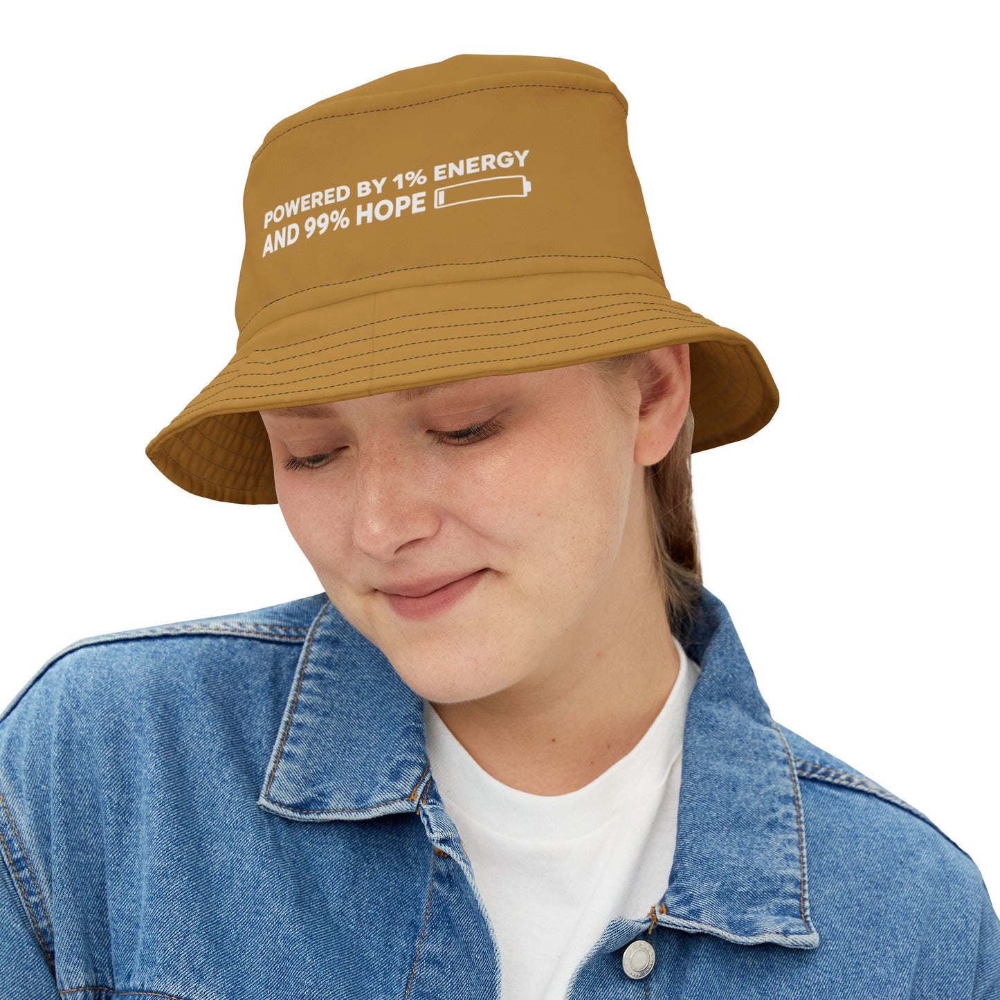 Brown bucket hat with funny motivational text 'Powered By 1% Energy And 99% Hope' on a white background. TEEZOCA