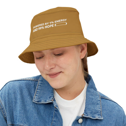 Brown bucket hat with funny motivational text 'Powered By 1% Energy And 99% Hope' on a white background. TEEZOCA