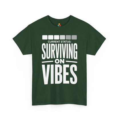 Green t-shirt with white text 'CURRENT STATUS: Surviving on VIBES' on a white background | TEEZOCA