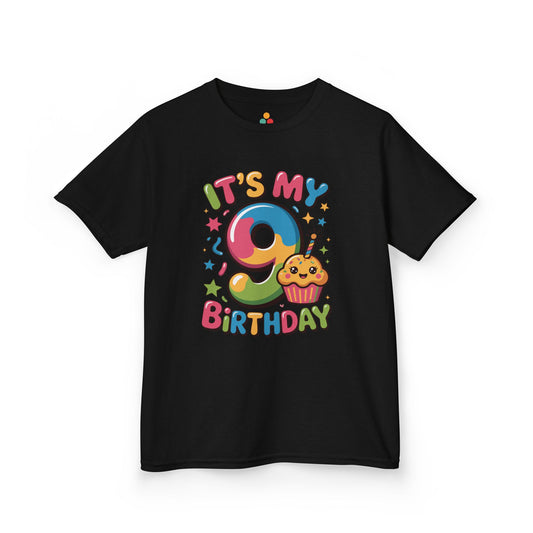 “Black ‘It’s My 9th Birthday’ shirt with rainbow 9 and smiling cupcake, confetti and stars, kids unisex tee, flat display.”

