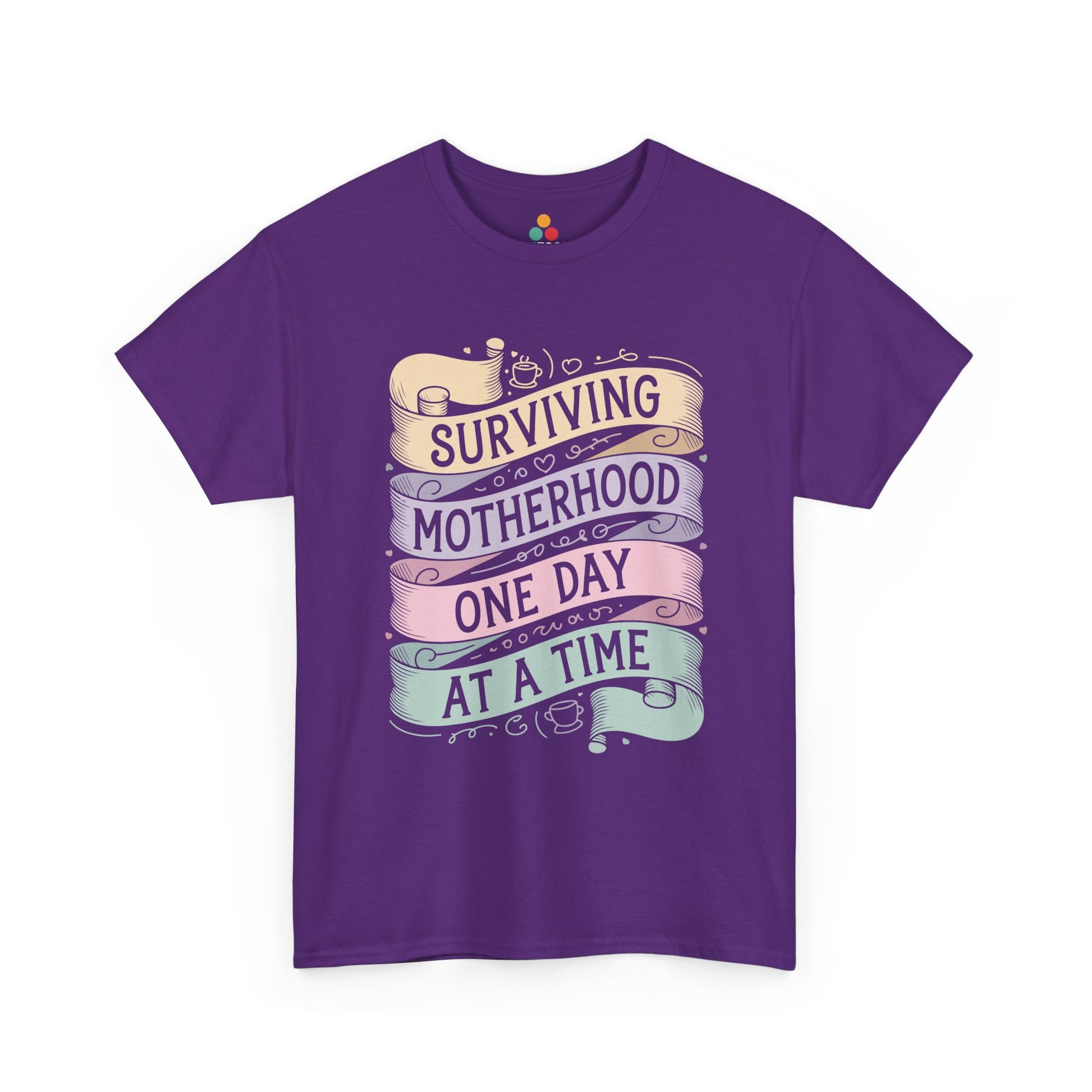 TEEZOCA purple “Surviving Motherhood One Day At A Time” pastel mom life t‑shirt displayed flat.