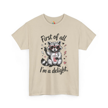 TEEZOCA beige “First of all I’m a delight” raccoon peace sign tee displayed flat.
