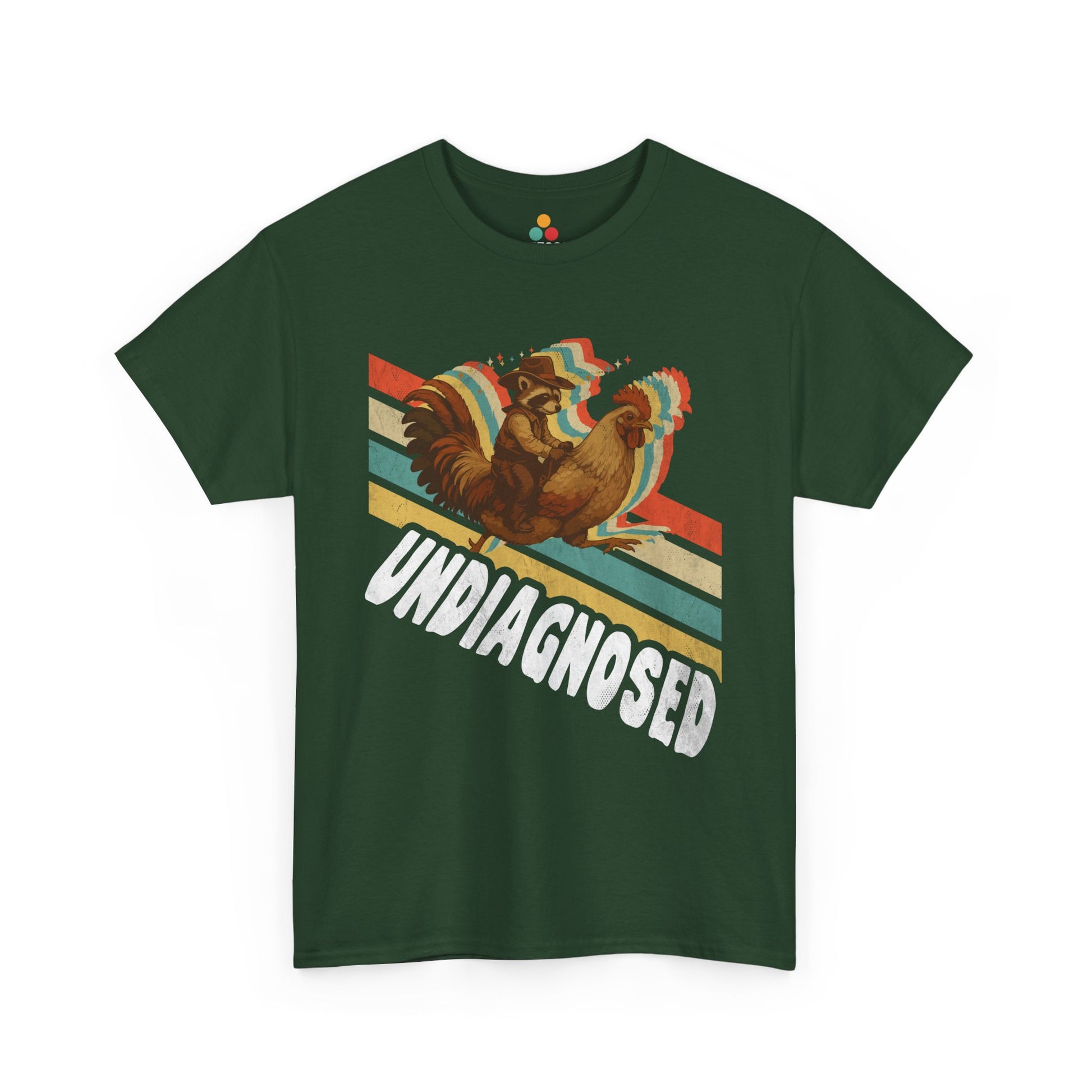 “Teezoca Undiagnosed shirt, cowboy raccoon and rooster illustration, forest green tee, flat lay.”
