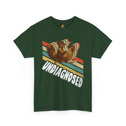 “Teezoca Undiagnosed shirt, cowboy raccoon and rooster illustration, forest green tee, flat lay.”
