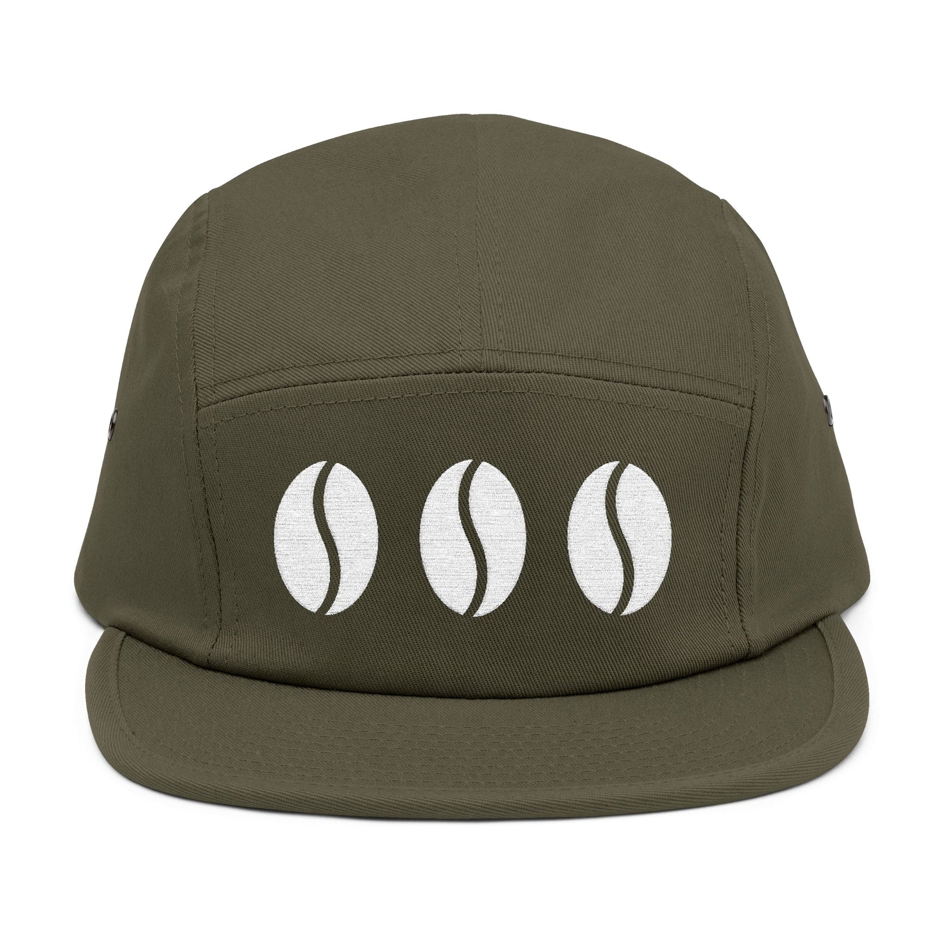 Green cap with three white coffee bean icons on a white background. Triple coffee bean minimalist embroidery on 5-panel cap. TEEZOCA