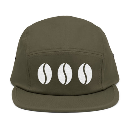 Green cap with three white coffee bean icons on a white background. Triple coffee bean minimalist embroidery on 5-panel cap. TEEZOCA