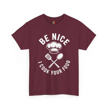 “Teezoca Be Nice I Cook Your Food shirt, white chef hat and utensil design, maroon tee, flat front display.”

