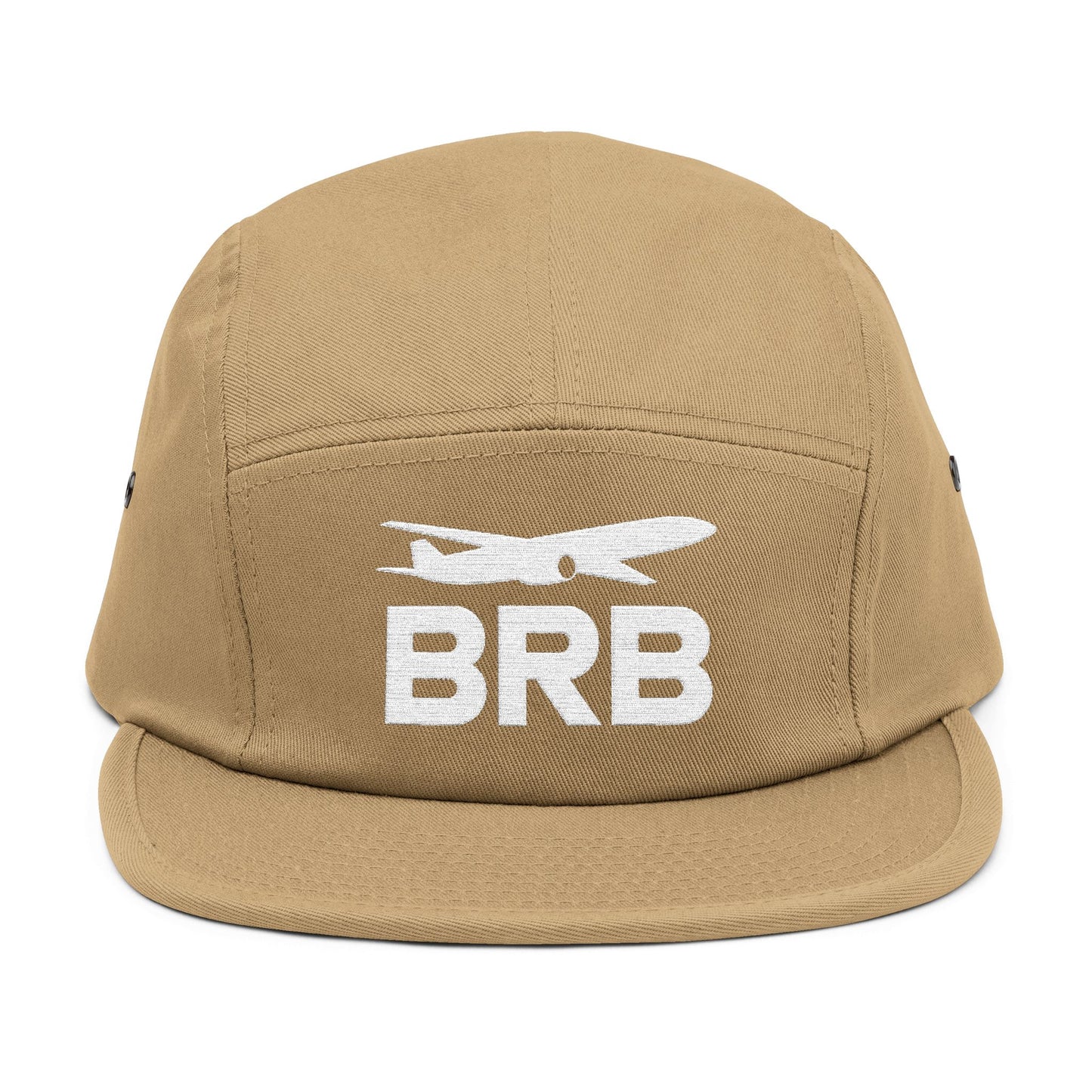Tan cap with 'BRB' and airplane logo on a white background. Minimalist BRB airplane embroidered design for 5-panel cap by TEEZOCA