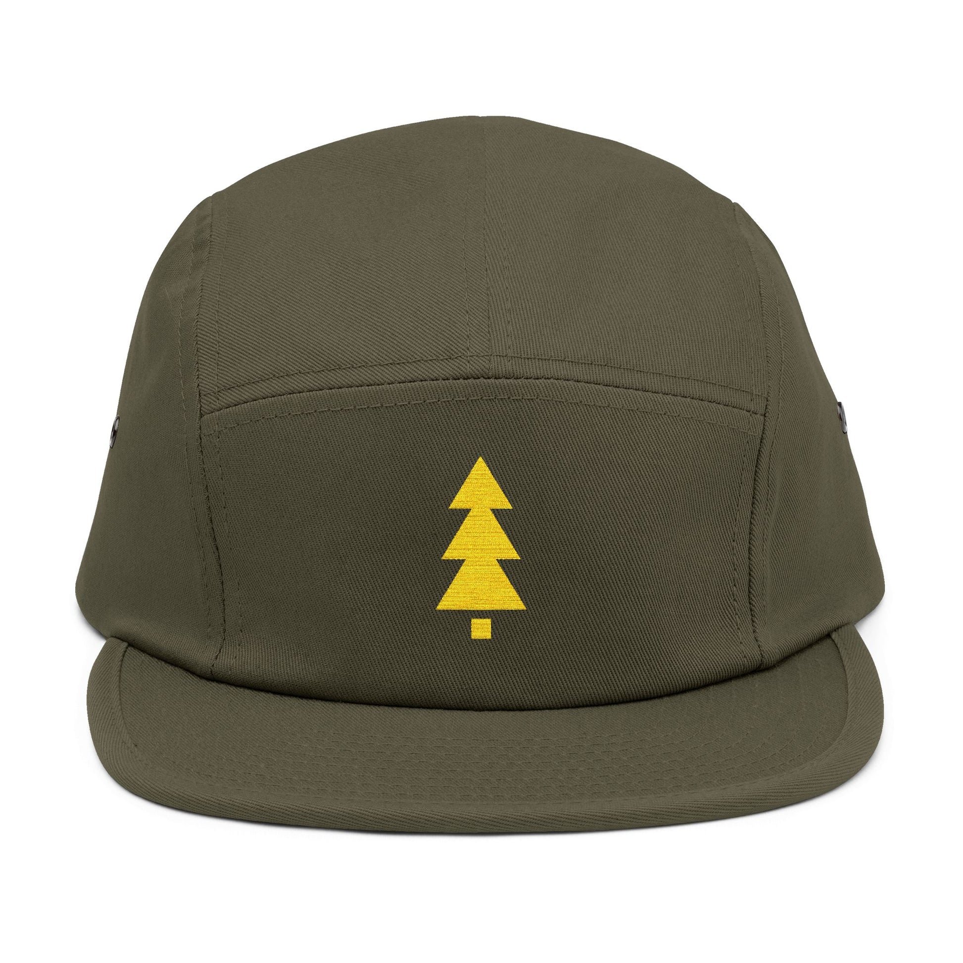 Green cap with a yellow tree logo on a white background. Minimalist geometric Christmas tree embroidery icon in gold.