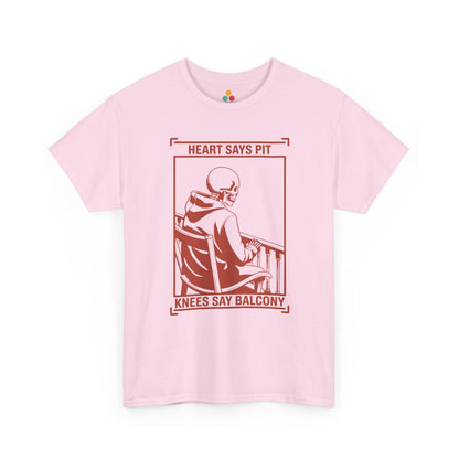 Pink t-shirt mockup with “Heart Says Pit Knees Say Balcony” skeleton concert quote graphic on front.