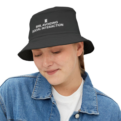 Funny black bucket hat with text 'BRB, Avoiding Social Interaction' on a white background. TEEZOCA