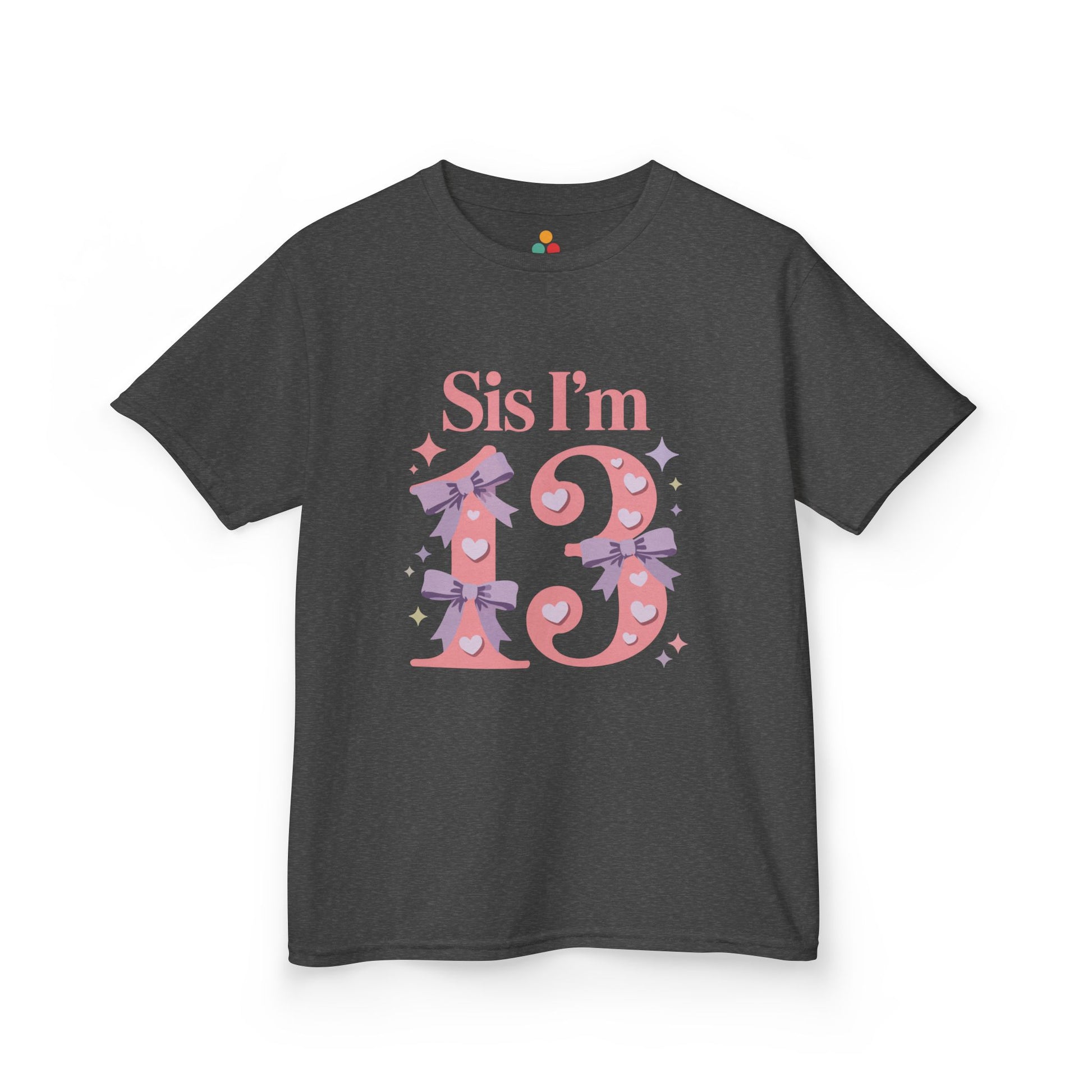 Charcoal grey t‑shirt with pink “Sis I’m 13” design featuring hearts, lilac bows, and sparkles, flat front view.