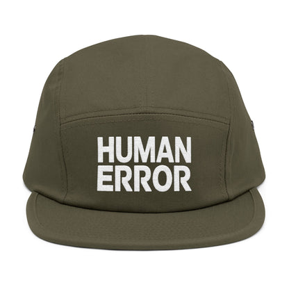 Green cap with 'HUMAN ERROR' text on a white background. Front view of an embroidered 5-panel cap featuring the bold “HUMAN ERROR” typography in white. TEEZOCA