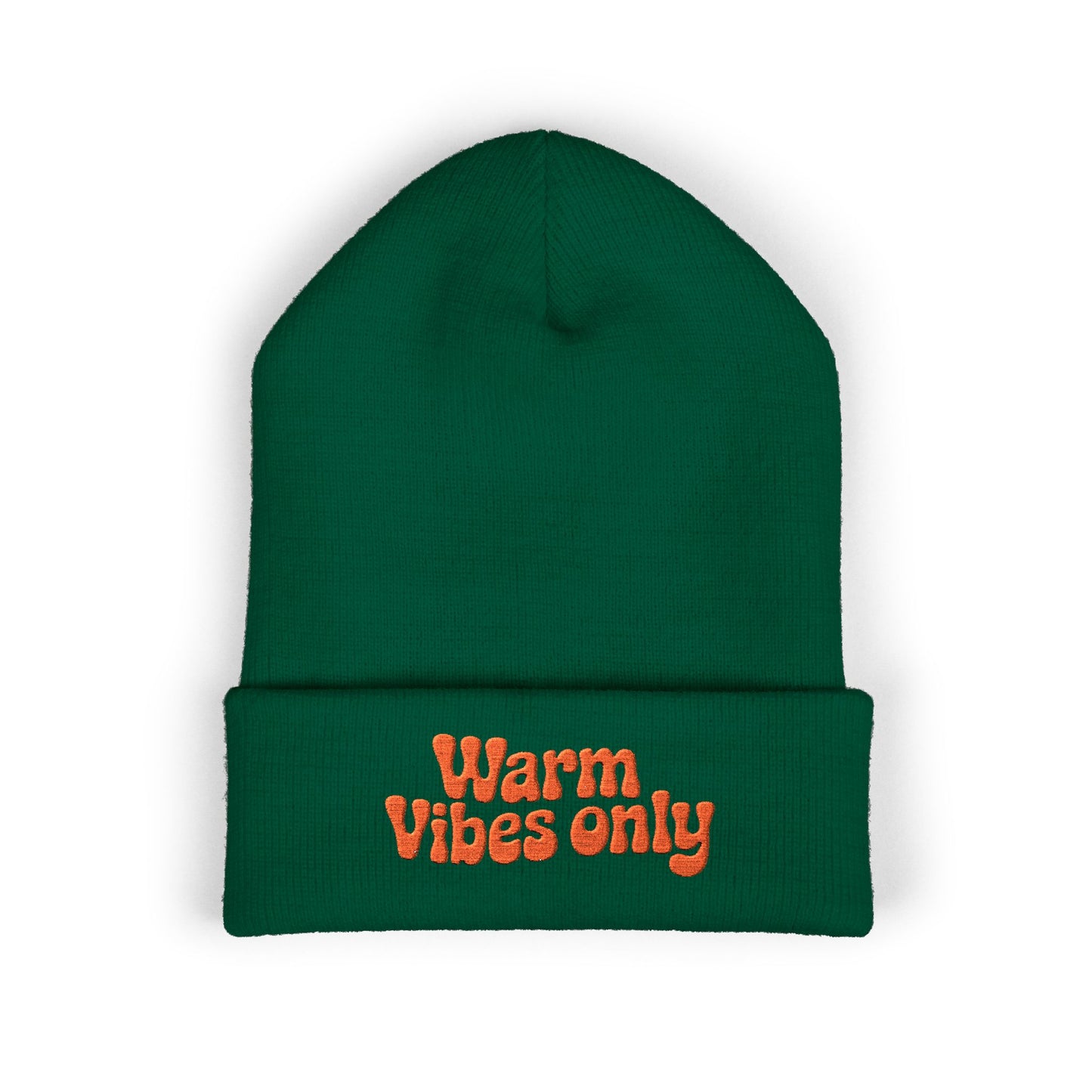 Green beanie with 'Warm Vibes only' text on a white background. Soft cuffed beanie featuring optimistic “Warm vibes only” embroidery.