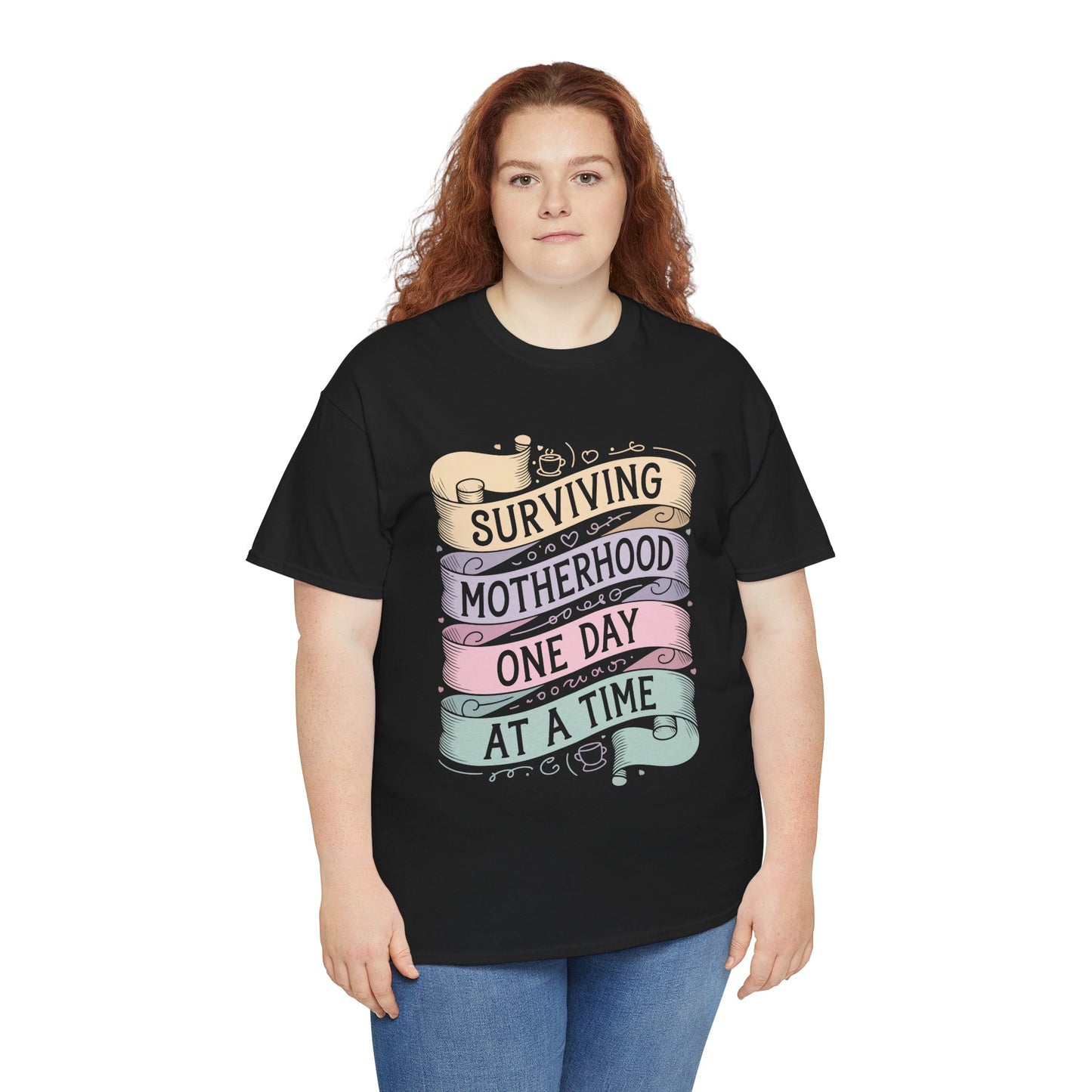 Women wearing a black TEEZOCA “Surviving Motherhood One Day At A Time” mom life t‑shirt.