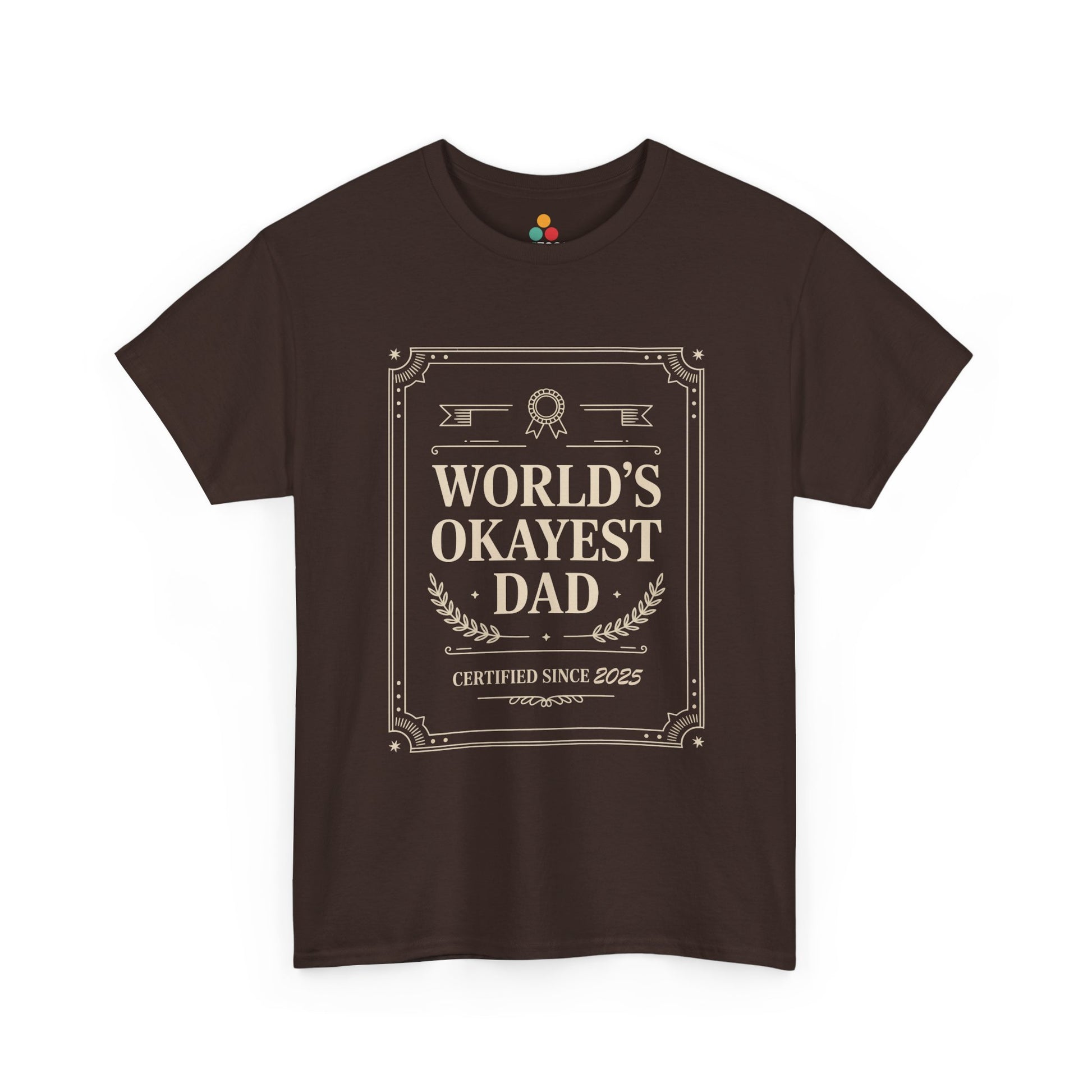 TEEZOCA brown “World’s Okayest Dad Certified Since 2025” sarcastic father T‑shirt shown flat.