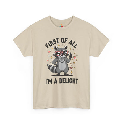 TEEZOCA beige “First Of All I’m A Delight” raccoon t‑shirt displayed flat.