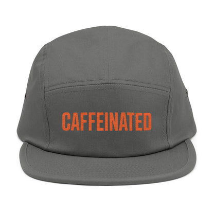 Gray cap with 'CAFFEINATED' text in orange on a white background. Caffeinated bold typography graphic design in orange. TEEZOCA