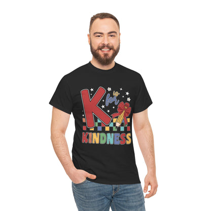 “Male teacher in Teezoca K is for Kindness t-shirt, bold red K and rainbow kindness letters, black tee, casual pose.”

