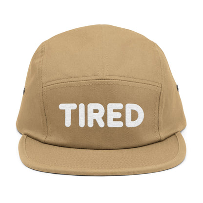 Tan cap with 'TIRED' text on a white background. TIRED minimalist text embroidered on 5-panel cap by TEEZOCA