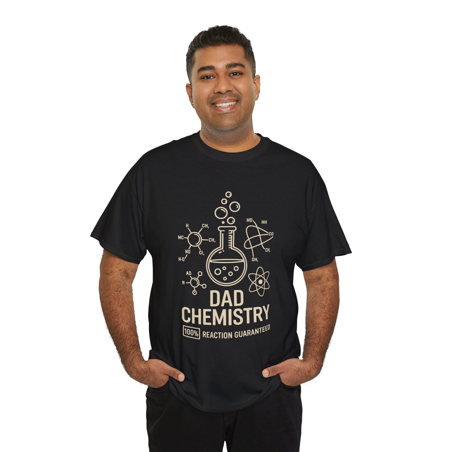 Smiling man wearing a TEEZOCA “Dad Chemistry 100% Reaction Guaranteed” funny science dad T‑shirt.
