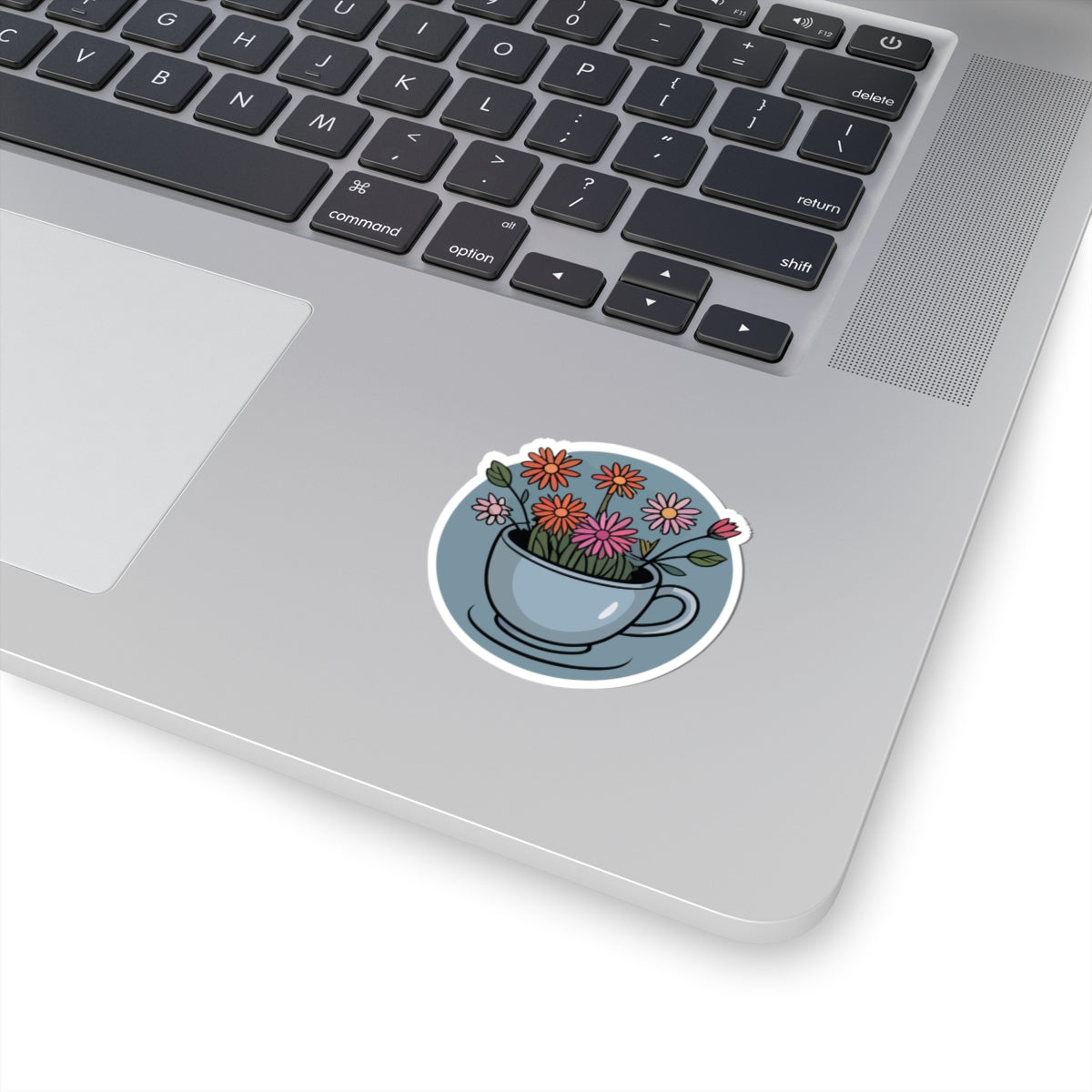 TEEZOCA flower teacup sticker featuring blooming wildflowers, cozy tea art, and soft pastel colors