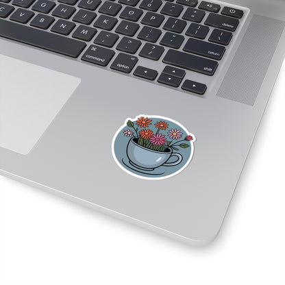 TEEZOCA flower teacup sticker featuring blooming wildflowers, cozy tea art, and soft pastel colors